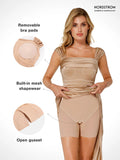 Vestido largo moldeador con hombros descubiertos, fruncido y brillo
