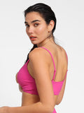 Completo bikini modellante con top e slip arricciati e modellanti