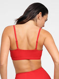 Completo bikini modellante con top e slip arricciati e modellanti